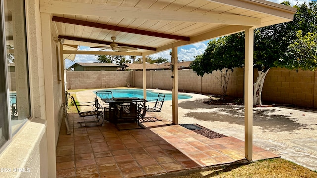 view of patio / terrace featuring ceiling fan