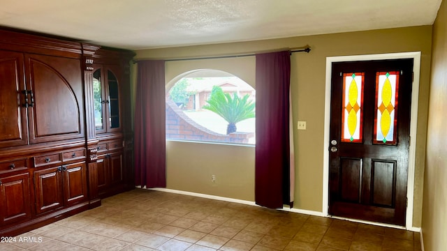 view of tiled foyer