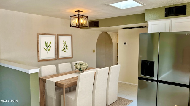 view of tiled dining space