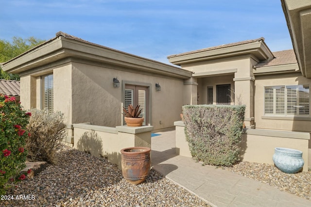 exterior space with stucco siding