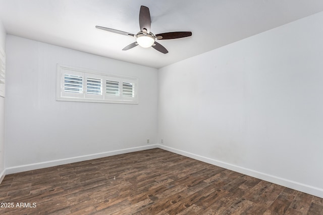1334 W Sells Dr, Phoenix, AZ 85013 - unfurnished room with dark wood-style flooring, a ceiling fan, and baseboards