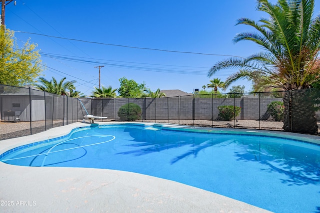 1334 W Sells Dr, Phoenix, AZ 85013 - view of swimming pool featuring a diving board and a fenced backyard