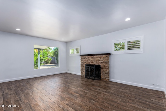 1334 W Sells Dr, Phoenix, AZ 85013 - unfurnished living room with a fireplace, dark wood-style floors, baseboards, and recessed lighting
