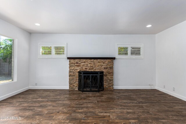 1334 W Sells Dr, Phoenix, AZ 85013 - unfurnished living room featuring wood finished floors, baseboards, recessed lighting, and a fireplace