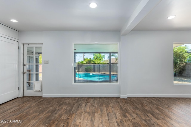 1334 W Sells Dr, Phoenix, AZ 85013 - spare room featuring plenty of natural light, wood finished floors, baseboards, and recessed lighting