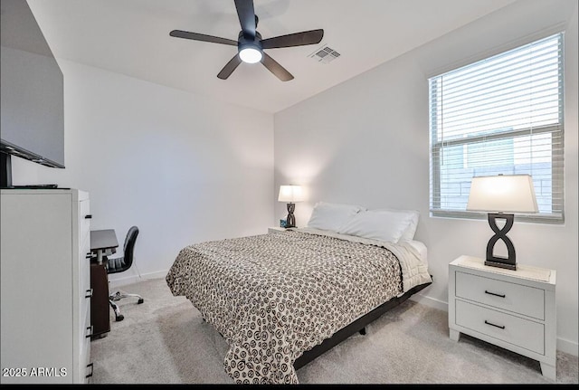16955 W Butler Ave, Waddell, AZ 85355 - bedroom with light carpet, baseboards, and multiple windows