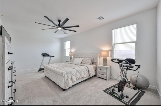 16955 W Butler Ave, Waddell, AZ 85355 - bedroom with light carpet, baseboards, and ceiling fan