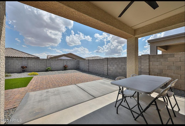 16955 W Butler Ave, Waddell, AZ 85355 - view of patio / terrace with a fenced backyard and outdoor dining space