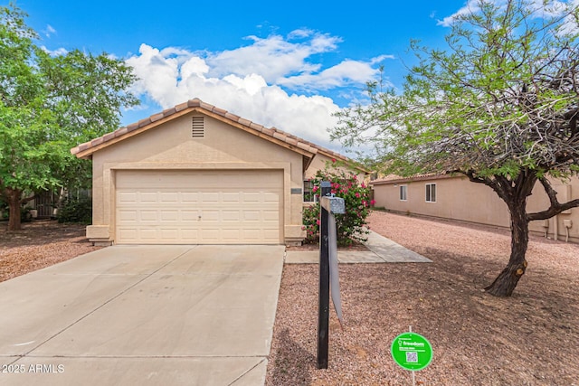 12132 W Dahlia Dr, El Mirage, AZ 85335 - ranch-style home with stucco siding, driveway, and a tiled roof
