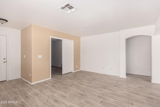 12132 W Dahlia Dr, El Mirage, AZ 85335 - unfurnished room featuring light wood-style flooring