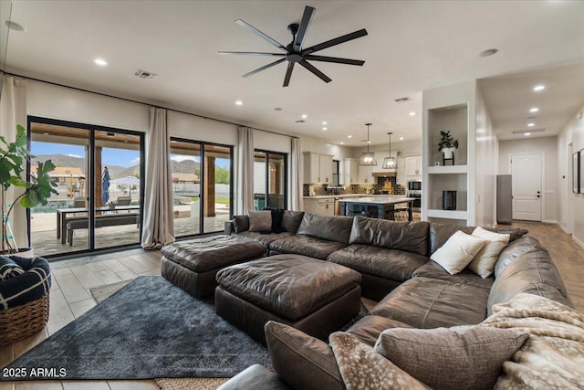 20715 E Watford Dr, Queen Creek, AZ 85142 - living area with ceiling fan and recessed lighting