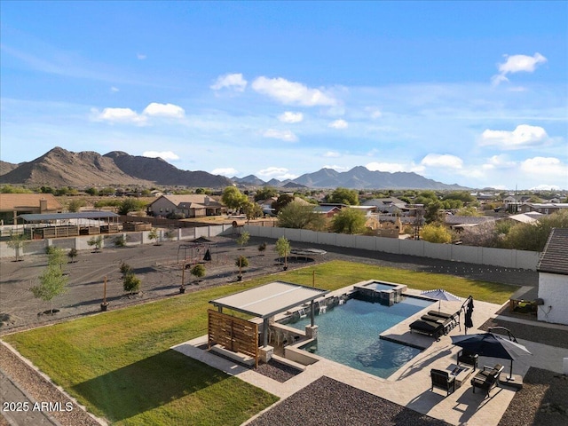 20715 E Watford Dr, Queen Creek, AZ 85142 - view of swimming pool with a mountain view, a patio, a pool with connected hot tub, and a residential view