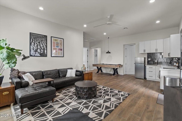 20715 E Watford Dr, Queen Creek, AZ 85142 - living room featuring dark wood-style floors, recessed lighting, ceiling fan, and pool table