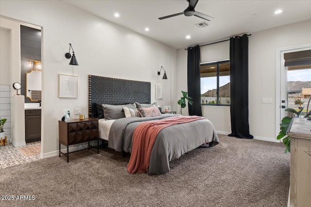 20715 E Watford Dr, Queen Creek, AZ 85142 - bedroom featuring light carpet, recessed lighting, baseboards, ensuite bath, and a ceiling fan