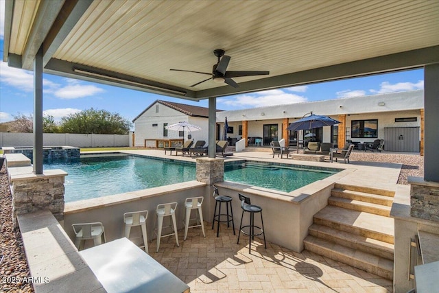 20715 E Watford Dr, Queen Creek, AZ 85142 - view of swimming pool with fence, a patio, a pool with connected hot tub, and ceiling fan