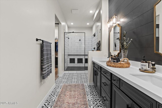 20715 E Watford Dr, Queen Creek, AZ 85142 - bathroom with a stall shower, double vanity, baseboards, and recessed lighting