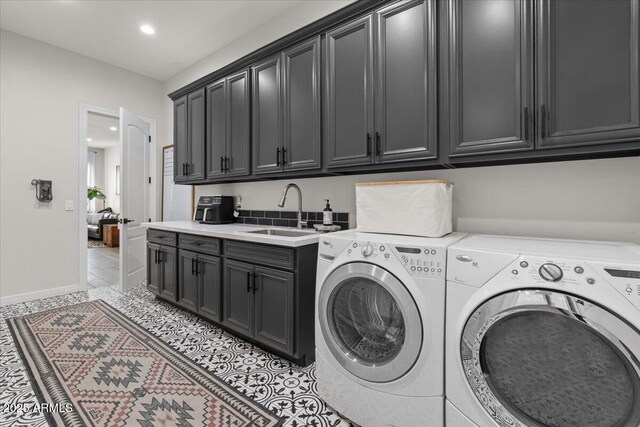 20715 E Watford Dr, Queen Creek, AZ 85142 - laundry room featuring independent washer and dryer, cabinet space, light tile patterned flooring, recessed lighting, and baseboards