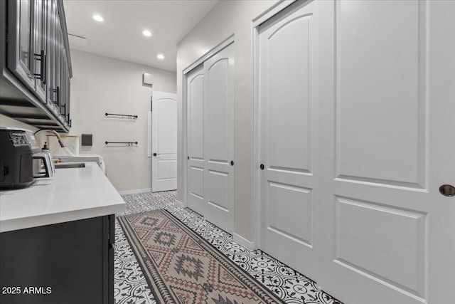 20715 E Watford Dr, Queen Creek, AZ 85142 - hall with a sink, baseboards, recessed lighting, and light tile patterned flooring