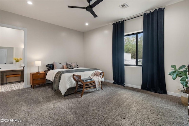 20715 E Watford Dr, Queen Creek, AZ 85142 - bedroom featuring light carpet, baseboards, recessed lighting, connected bathroom, and ceiling fan