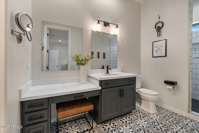 20715 E Watford Dr, Queen Creek, AZ 85142 - bathroom featuring toilet, vanity, and baseboards