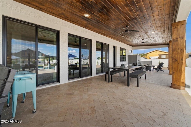 20715 E Watford Dr, Queen Creek, AZ 85142 - view of patio / terrace with outdoor dining area, ceiling fan, and fence