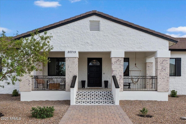 20715 E Watford Dr, Queen Creek, AZ 85142 - view of front of property featuring a porch and stucco siding