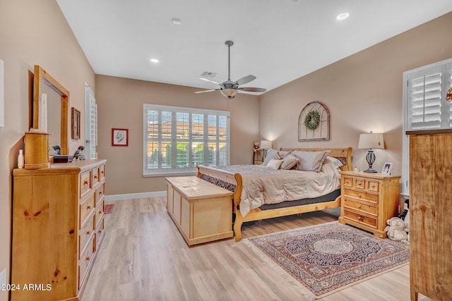 bedroom featuring visible vents, baseboards, a ceiling fan, light wood finished floors, and recessed lighting