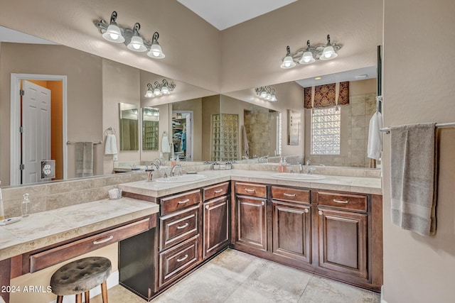 bathroom with double vanity and a sink
