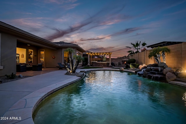 pool at dusk with a pergola, a patio area, an outdoor living space, fence, and a fenced in pool