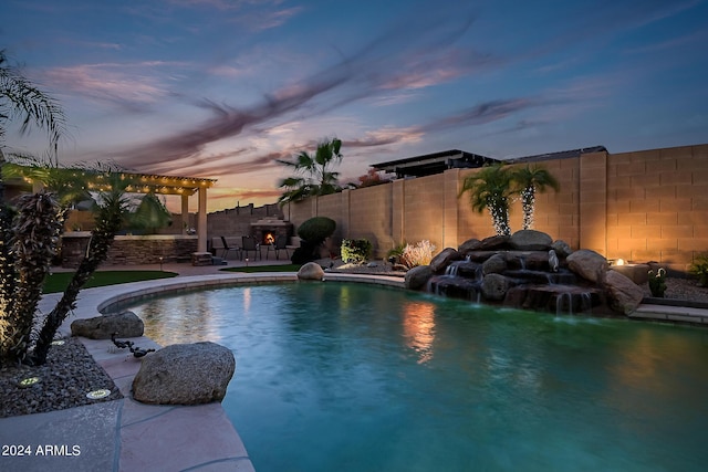 pool at dusk with a patio area, a fenced backyard, and a pergola