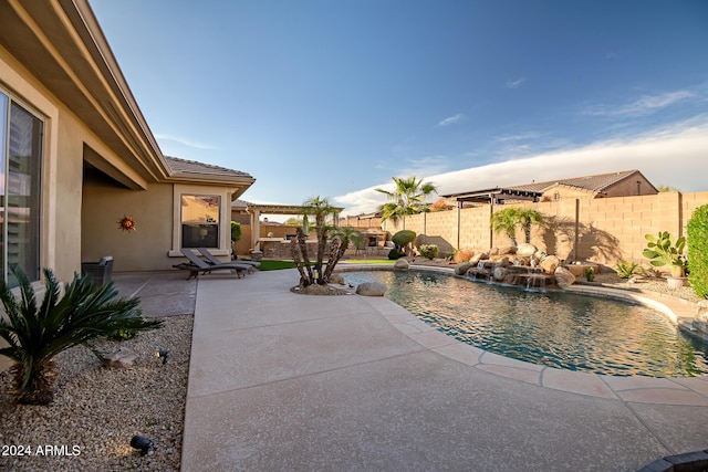 view of pool with a fenced in pool, a patio, and a fenced backyard