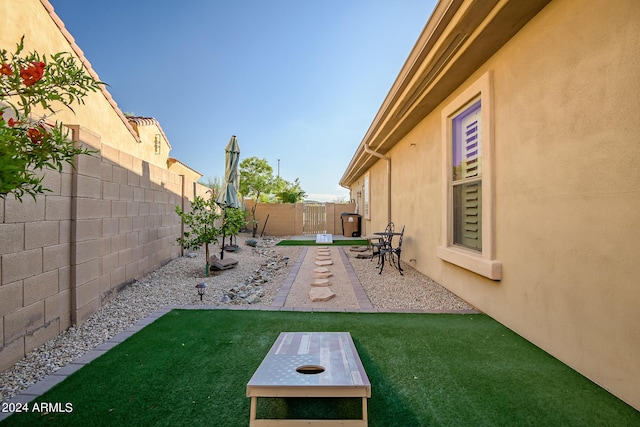 view of yard featuring a patio and a fenced backyard