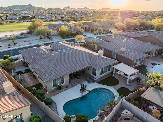 aerial view with a mountain view and a residential view
