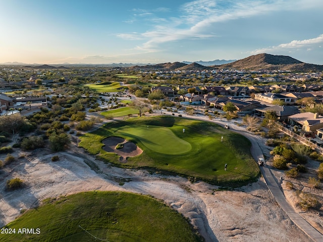 birds eye view of property featuring a mountain view, golf course view, and a residential view