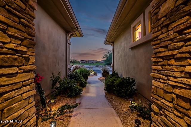 view of side of property featuring stucco siding