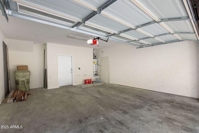 garage featuring a garage door opener and gas water heater