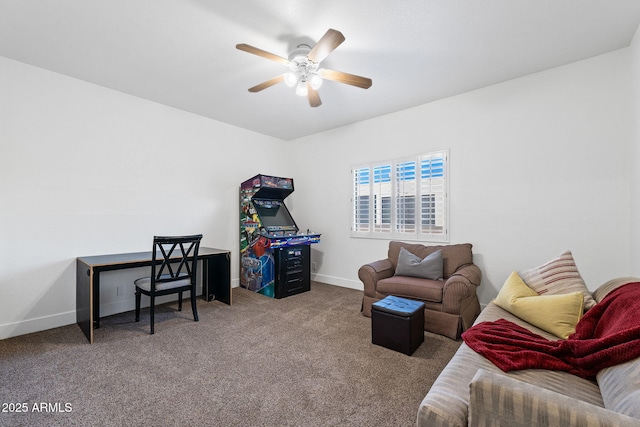 office space featuring a ceiling fan, baseboards, and carpet floors