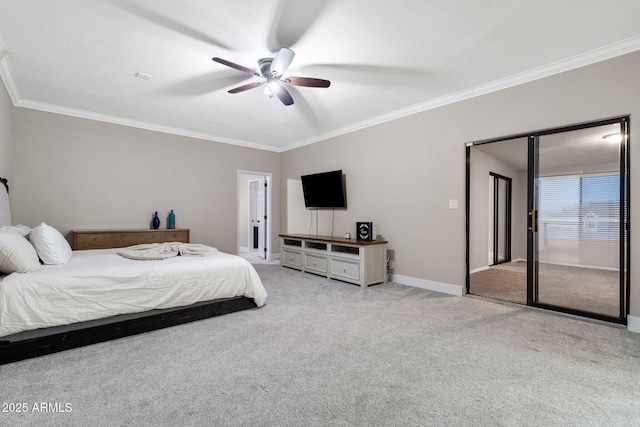 bedroom featuring baseboards, ornamental molding, ceiling fan, and carpet floors