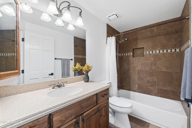 bathroom with visible vents, shower / tub combo, toilet, and vanity