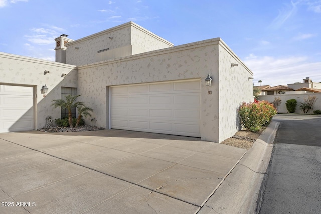 exterior space featuring a garage