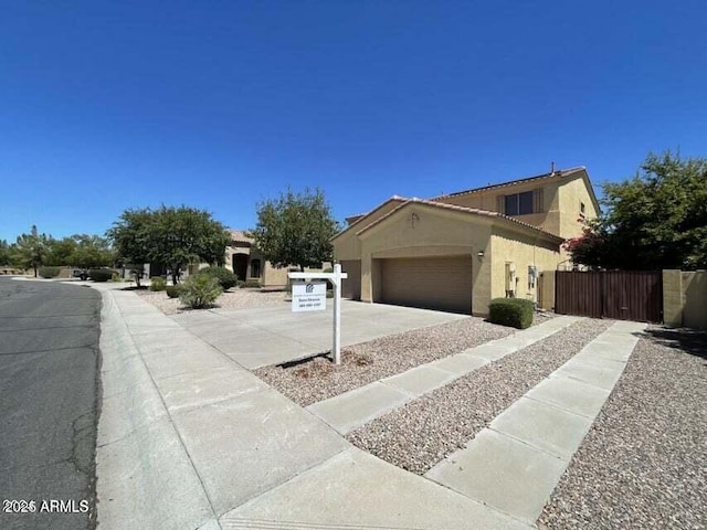 view of side of property featuring a garage