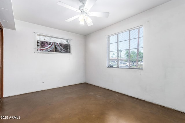 empty room featuring finished concrete flooring