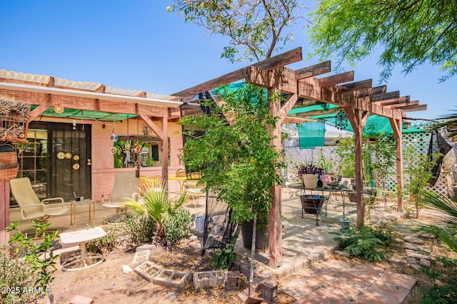 view of patio featuring a pergola
