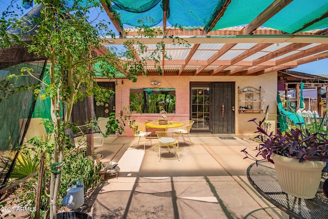 view of patio featuring a pergola