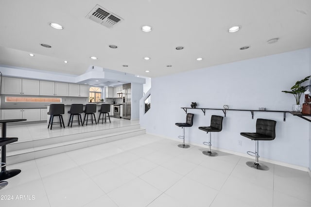 interior space with recessed lighting and baseboards