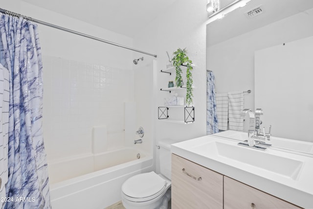 full bathroom with toilet, shower / bath combo, and vanity