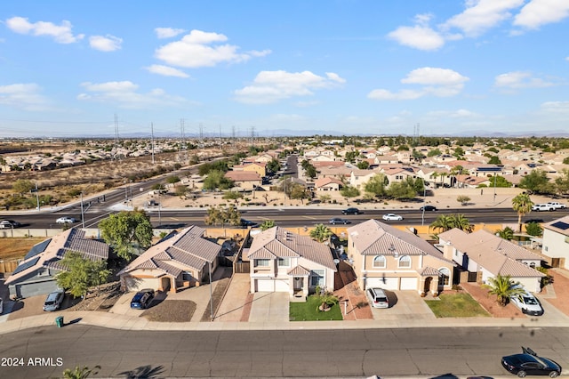 aerial perspective of suburban area with a mountain backdrop