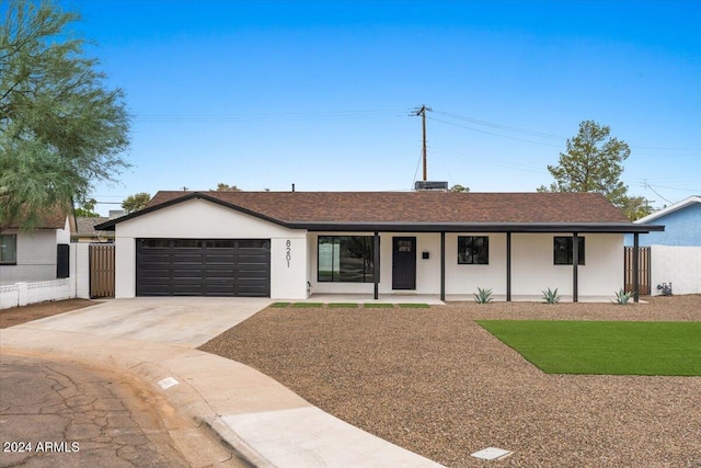 ranch-style home with a garage