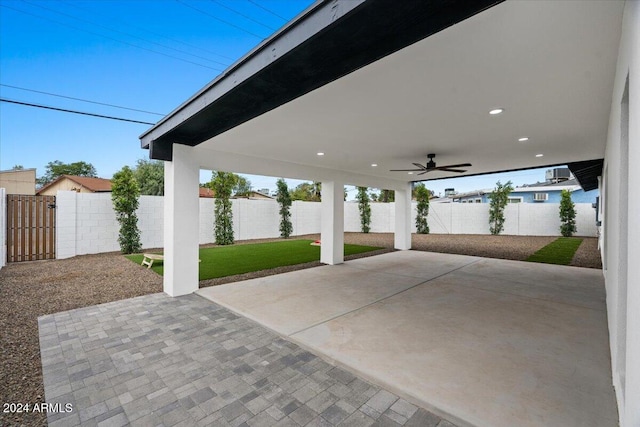 view of patio featuring ceiling fan