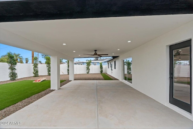 view of patio featuring ceiling fan